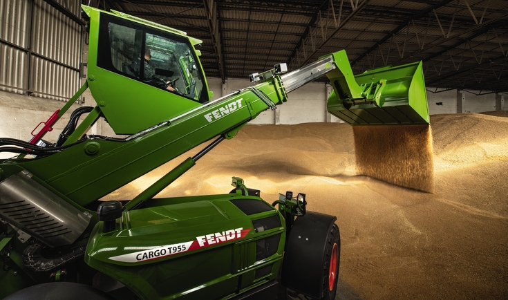 Telescopic loader with extended cab and telescopic arm